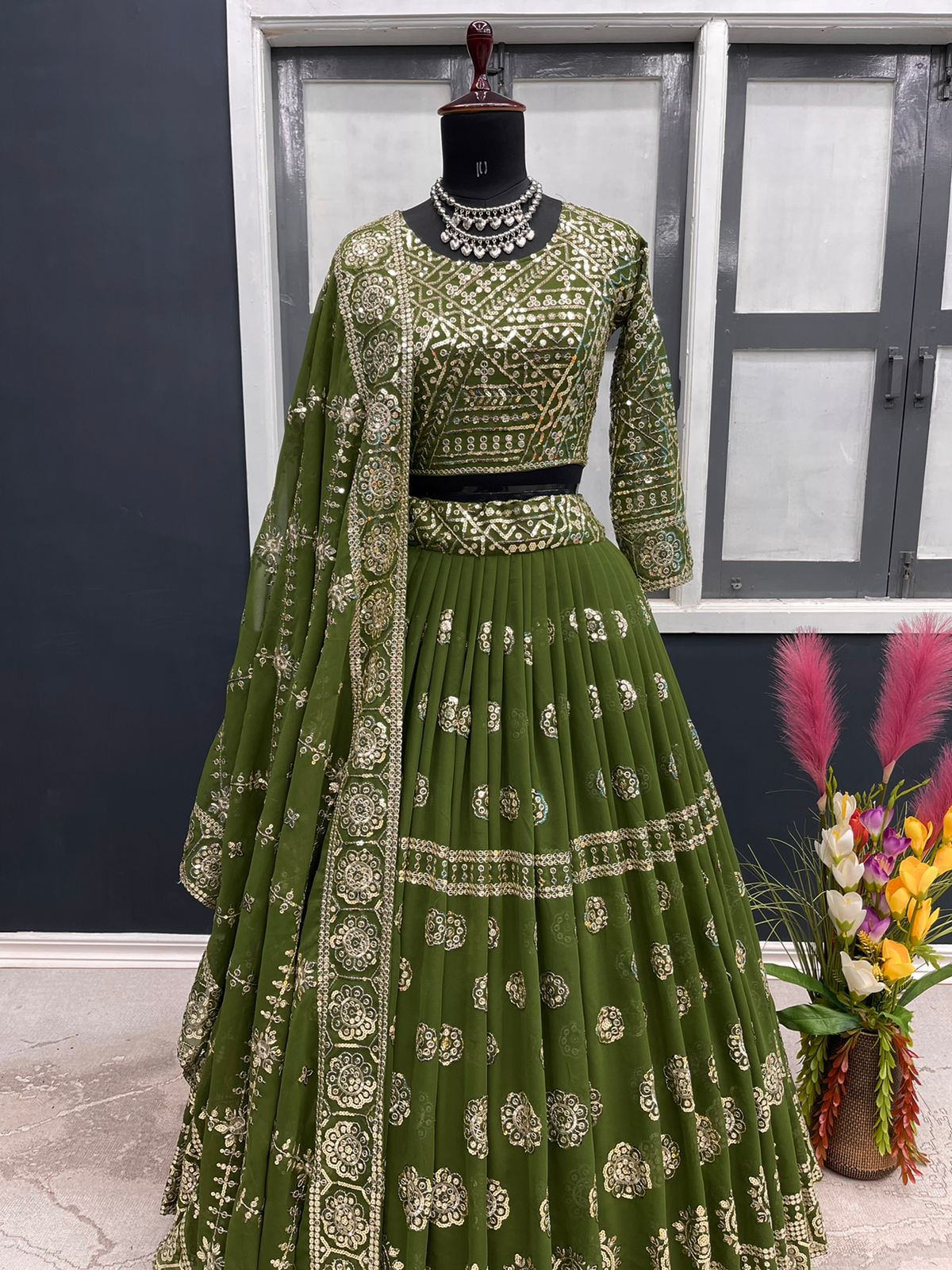 Stylish Mehendi Color Sequence Work Lehenga Choli Clothsvilla