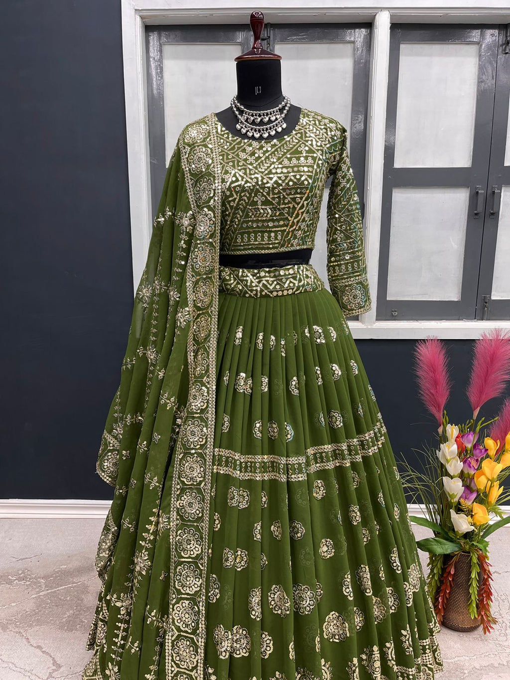 Stylish Mehendi Color Sequence Work Lehenga Choli Clothsvilla