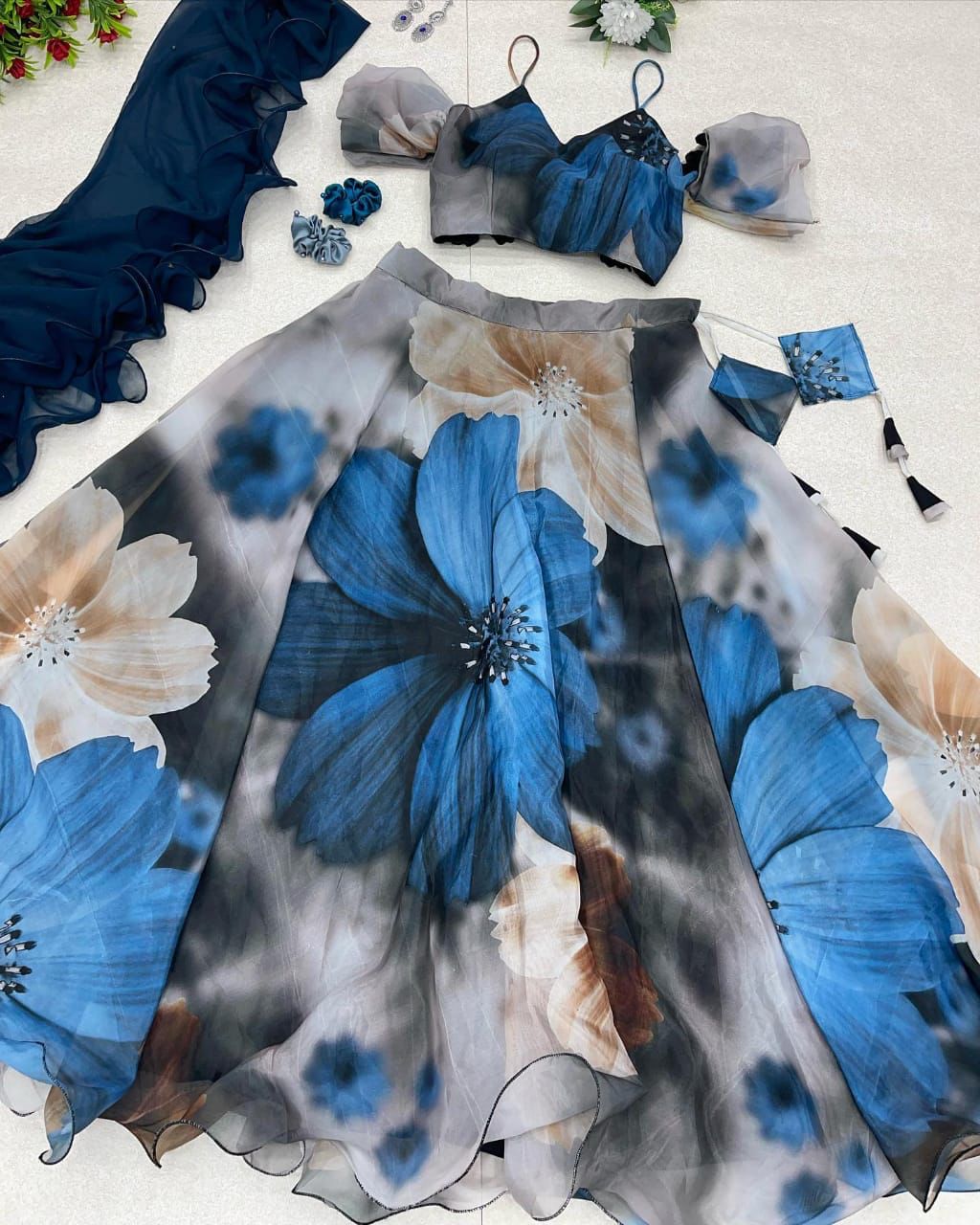 Daisy Sky Blue Color Printed Organza Lehenga Choli Clothsvilla