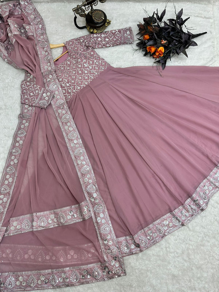 Presenting Dusty Pink Color With Work Georgette Gown Clothsvilla