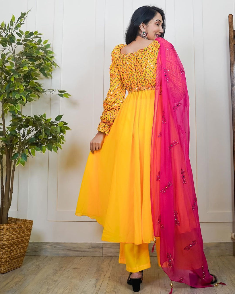 Yellow Anarkali Gown with Embroidery and Palazzo Clothsvilla