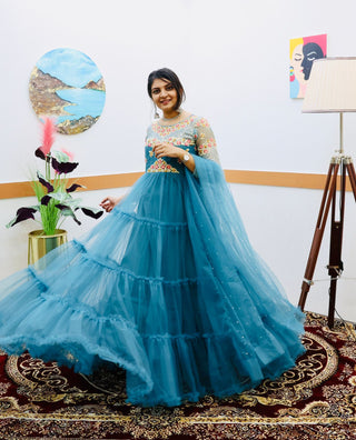 Festive Wear Sky Blue Color Ruffle Style Gown