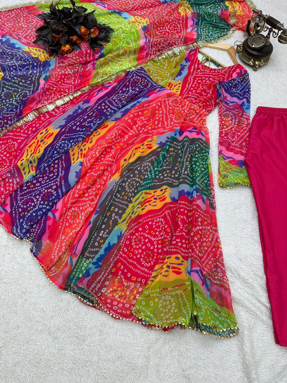 Good Looking Multi Color Print With Lacs Work Gown