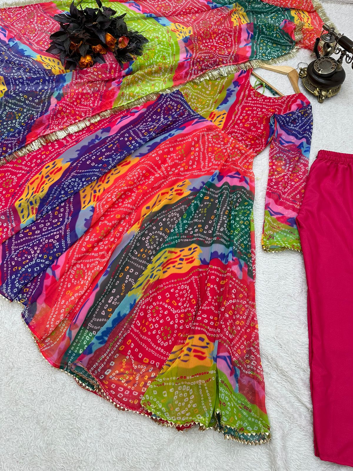Good Looking Multi Color Print With Lacs Work Gown