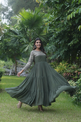 Fantastic Mehendi Green Color Zari Work Gown Clothsvilla