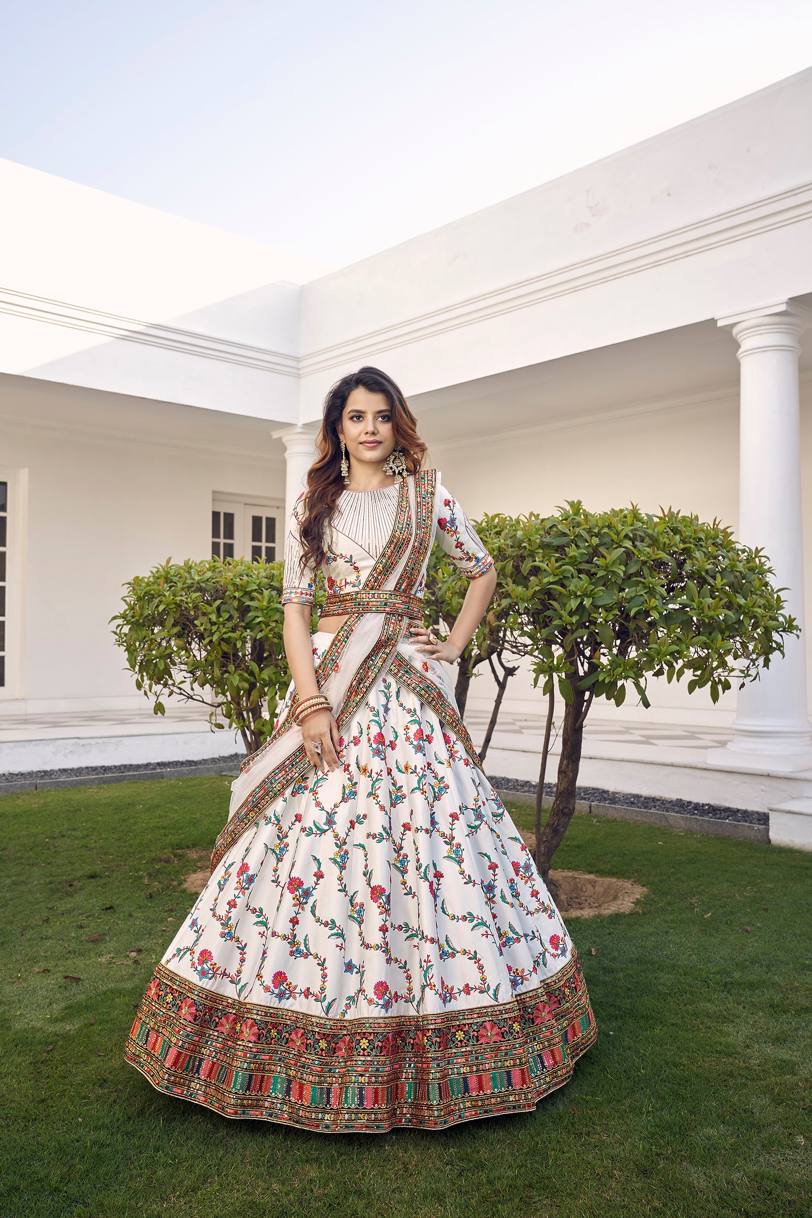 White Silk Embroidered Bridal Reception Heavy Border Lehenga Choli ClothsVilla