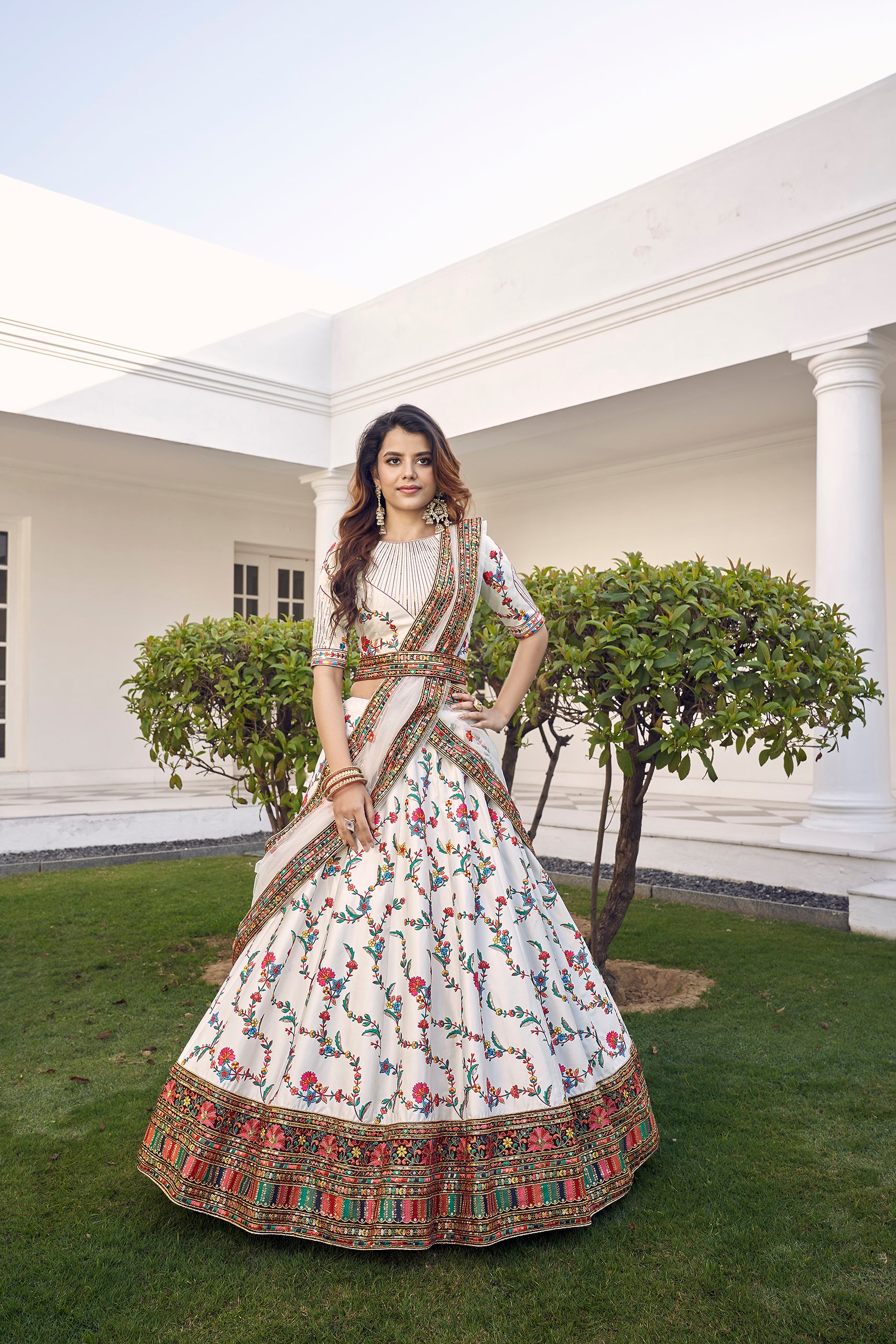 White Silk Embroidered Bridal Reception Heavy Border Lehenga Choli ClothsVilla