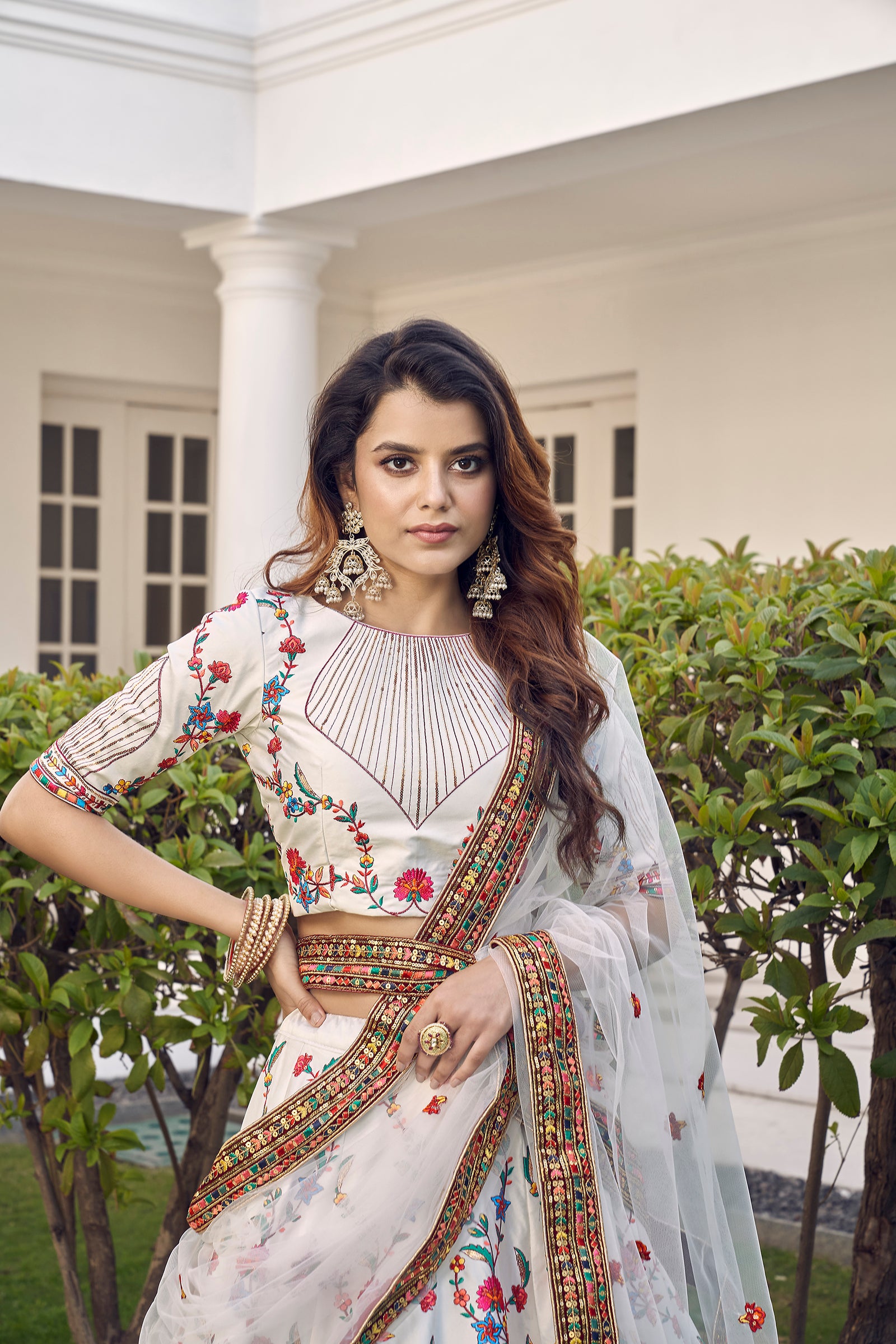 White Silk Embroidered Bridal Reception Heavy Border Lehenga Choli ClothsVilla