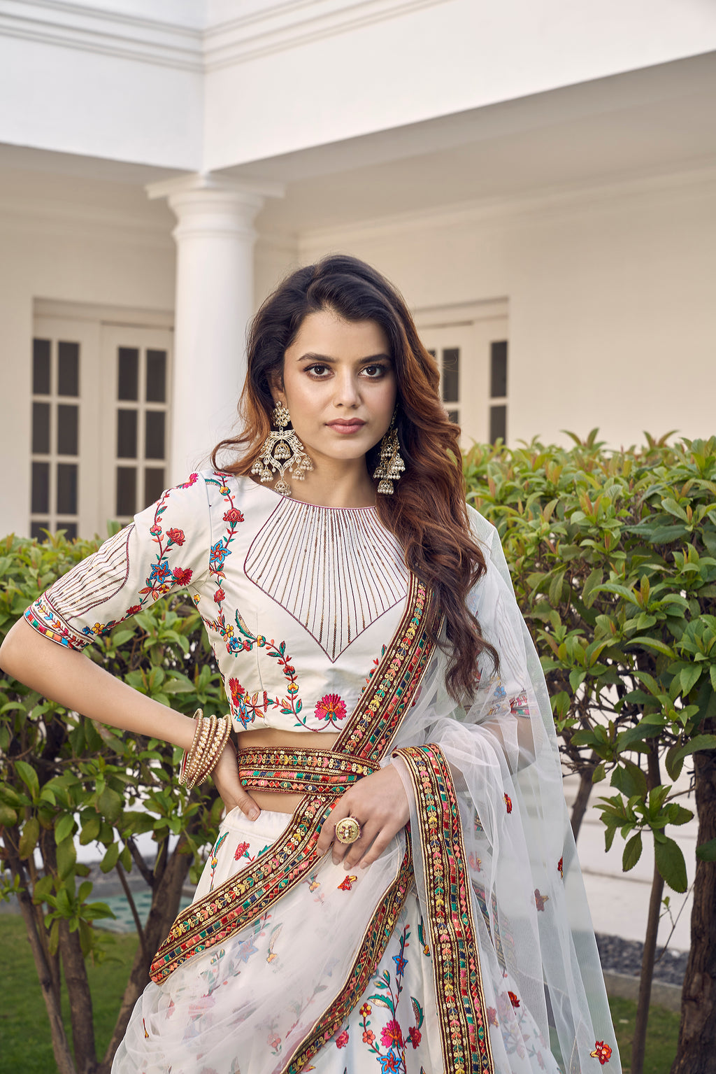 White Silk Embroidered Bridal Reception Heavy Border Lehenga Choli ClothsVilla