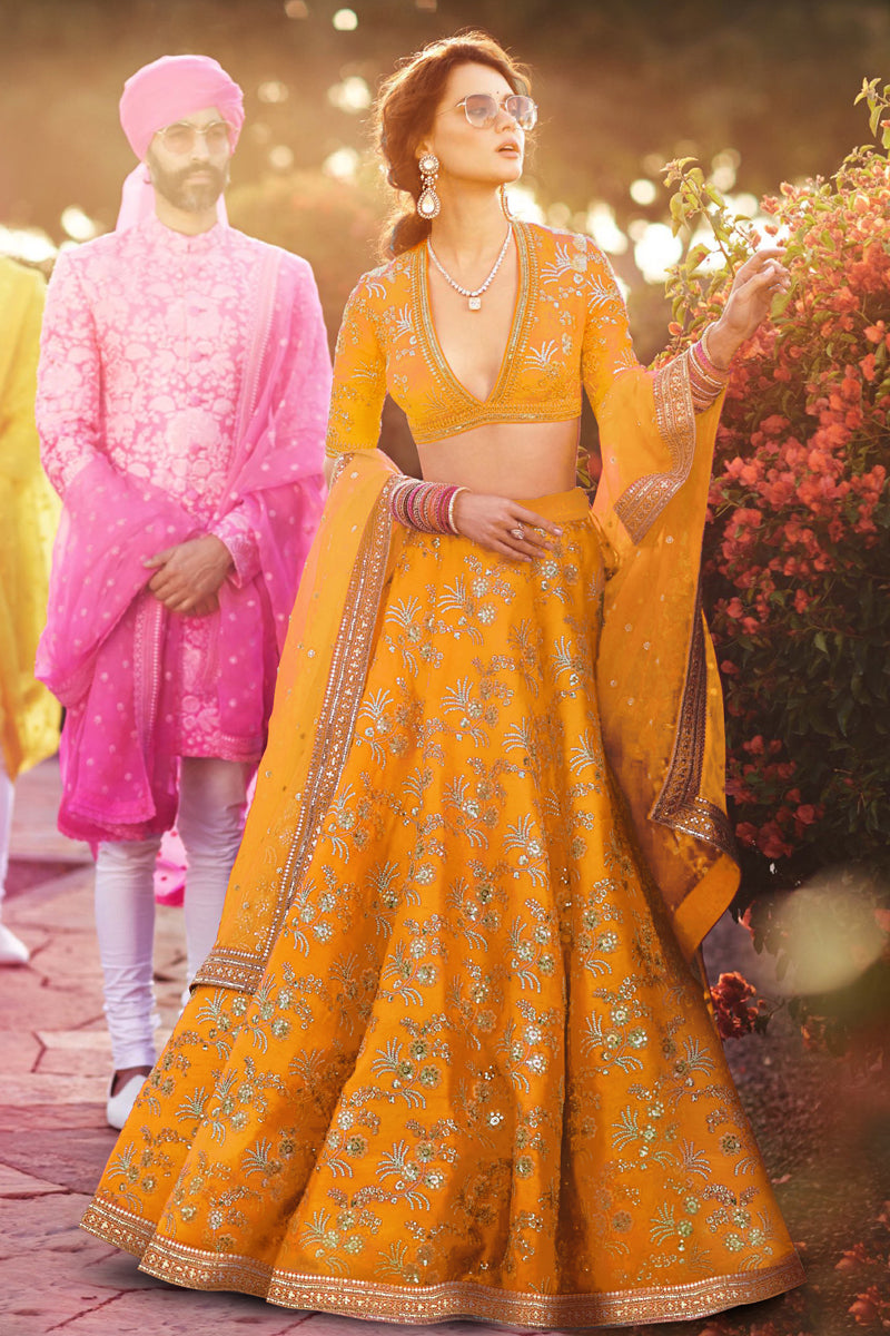 Hypnotic Yellow Colored Wedding Wear Embroidered Satin Lehenga Choli ClothsVilla Main image