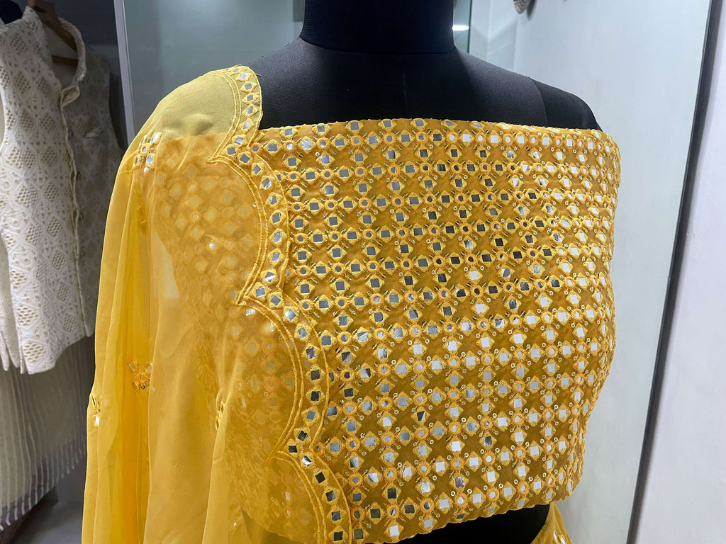 Yellow Embroidered Semi-Stitched Lehenga In Pure Organza Clothsvilla