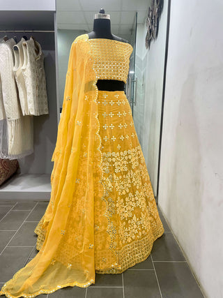 Yellow Embroidered Semi-Stitched Lehenga In Pure Organza Clothsvilla