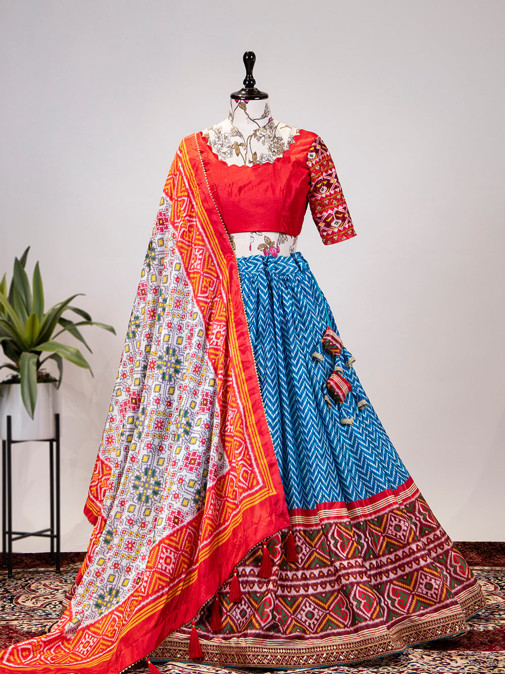 Blue Color Leheriya Patola Print Chinon Lehenga Choli Clothsvilla