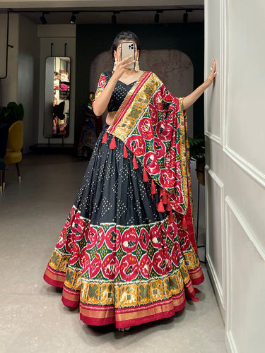 Black Color Patola Print With Foil Work Tussar Silk Lehenga Choli ClothsVilla.com