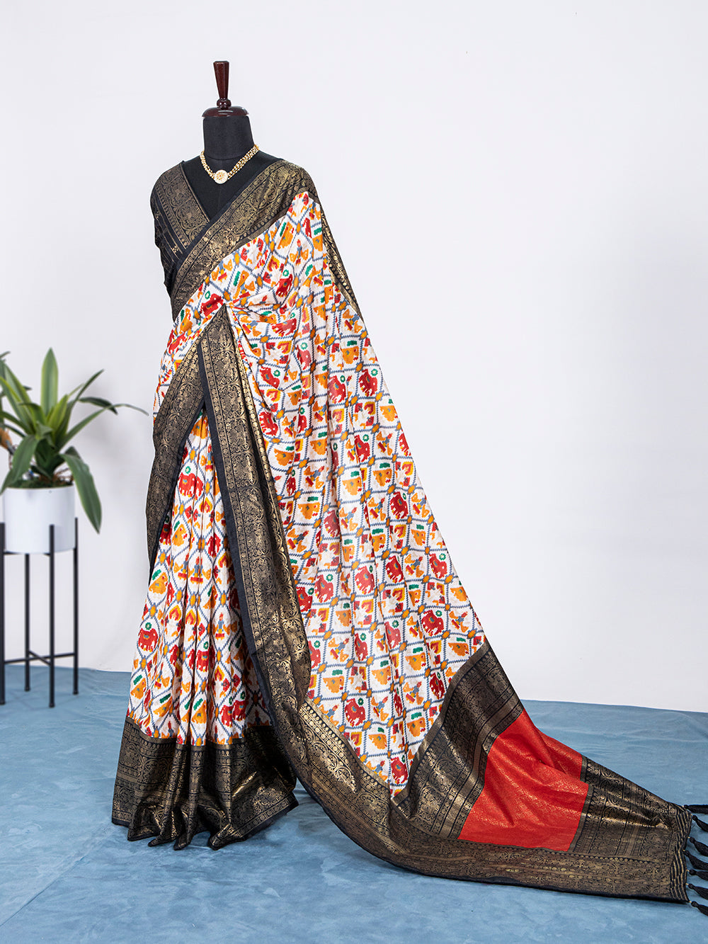 Black Color Patola Print with Foil Work Dola Silk Saree Clothsvilla