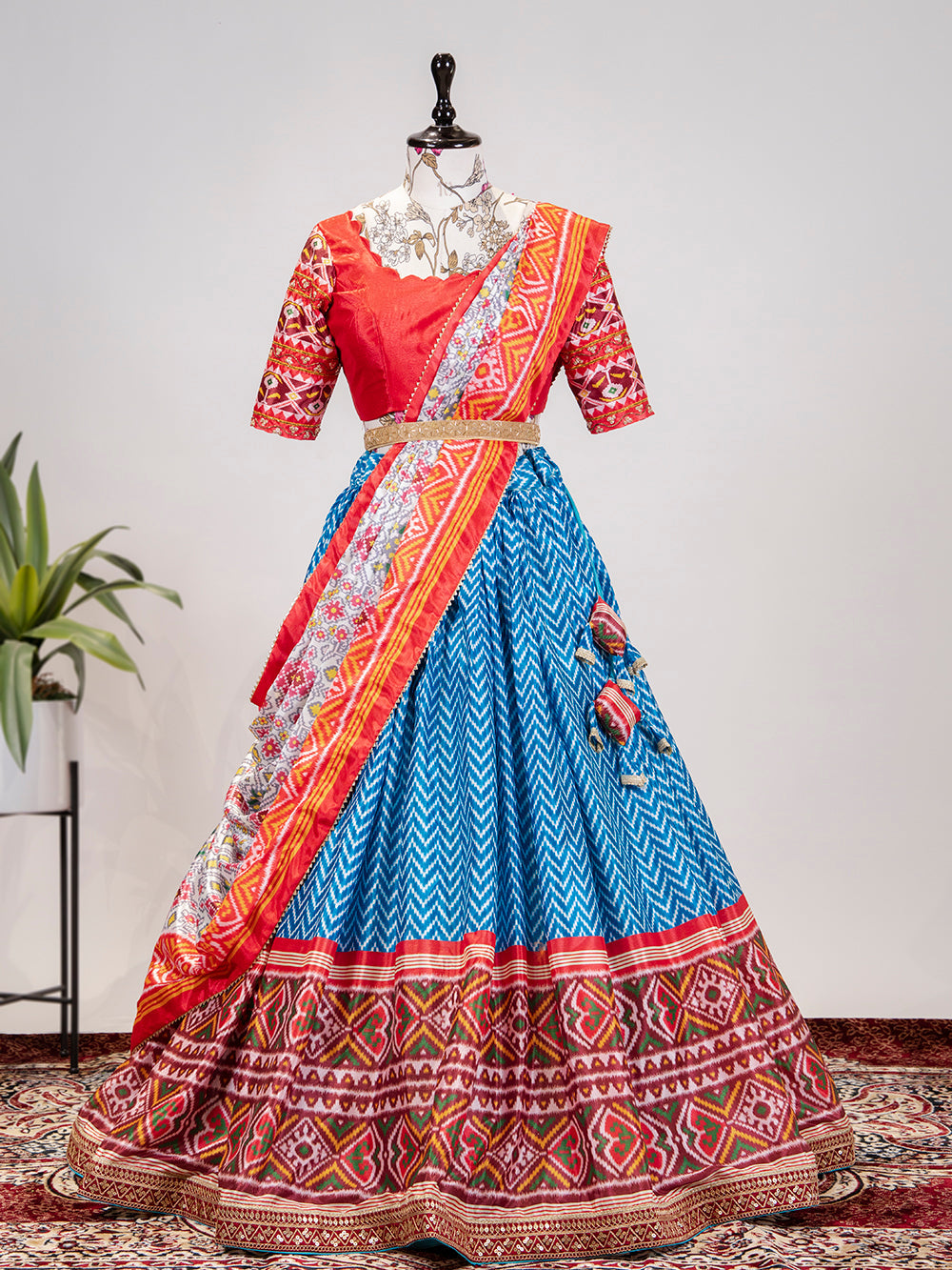 Blue Color Leheriya Patola Print Chinon Lehenga Choli Clothsvilla