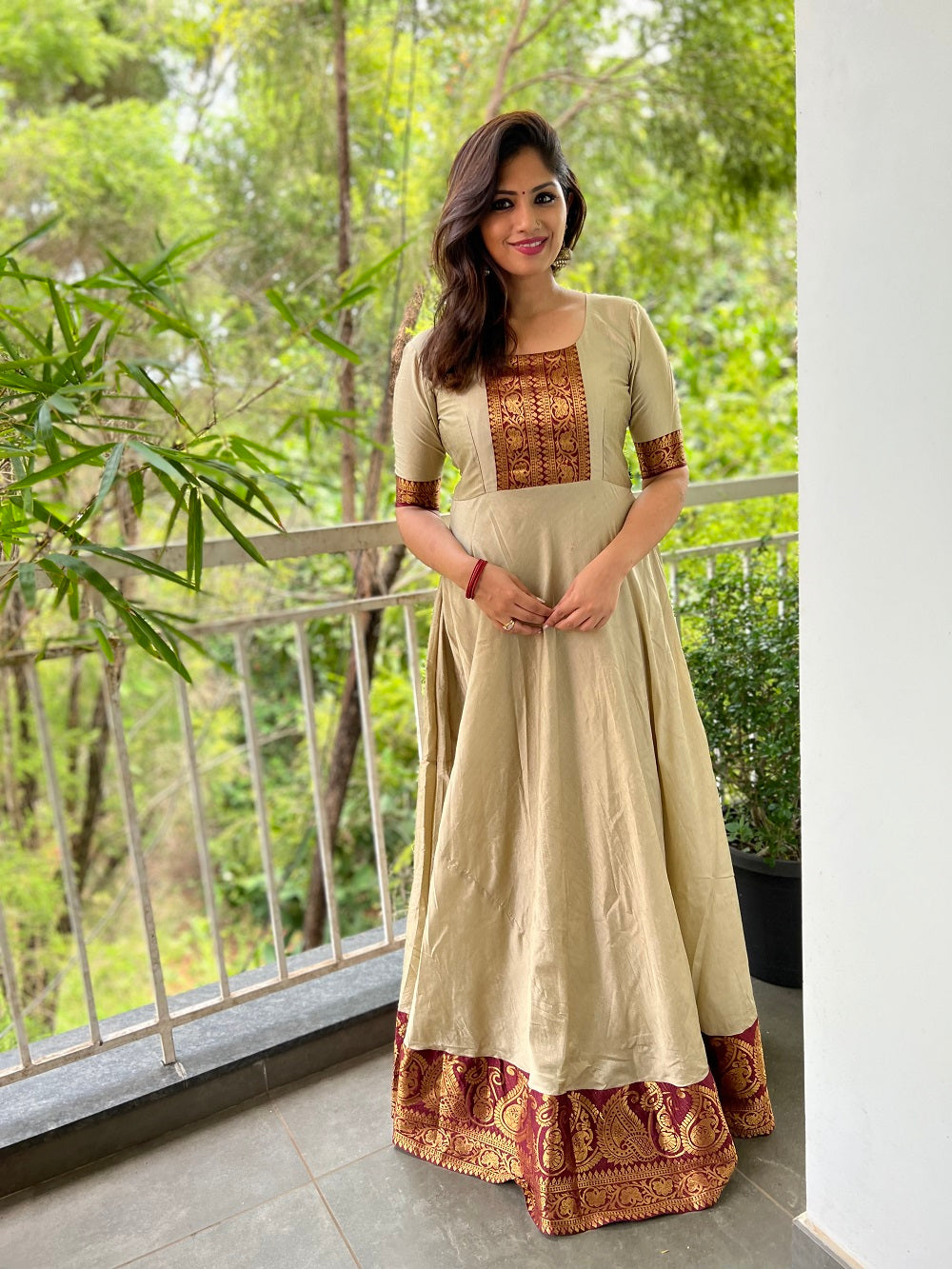 Chiku Color Weaving Zari Work Silk Gown Clothsvilla