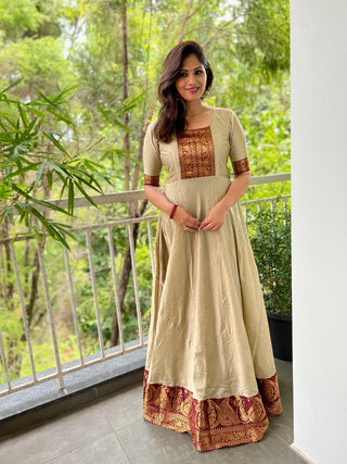 Chiku Color Weaving Zari Work Silk Gown Clothsvilla