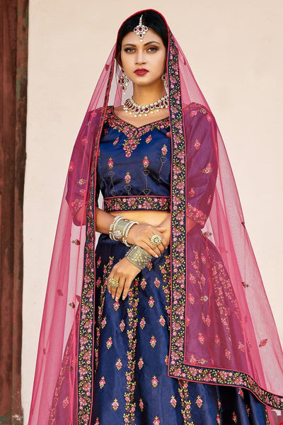 Spread your charm as you don this mesmerizing deep blue designer lehenga  choli set featuring colorful re… | Designer lehenga choli, Blue lehenga,  Party wear lehenga