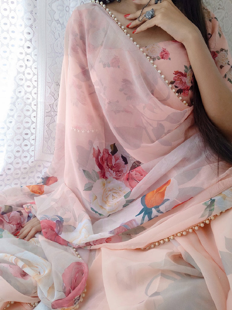 Peach Color Printed With Pearl Lace Border Georgette Saree Clothsvilla
