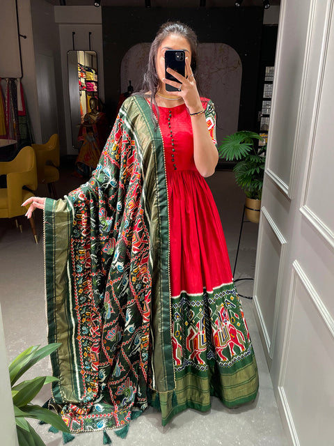 Red Color Patola And Foil Printed Dola Silk Gown Clothsvilla Main image