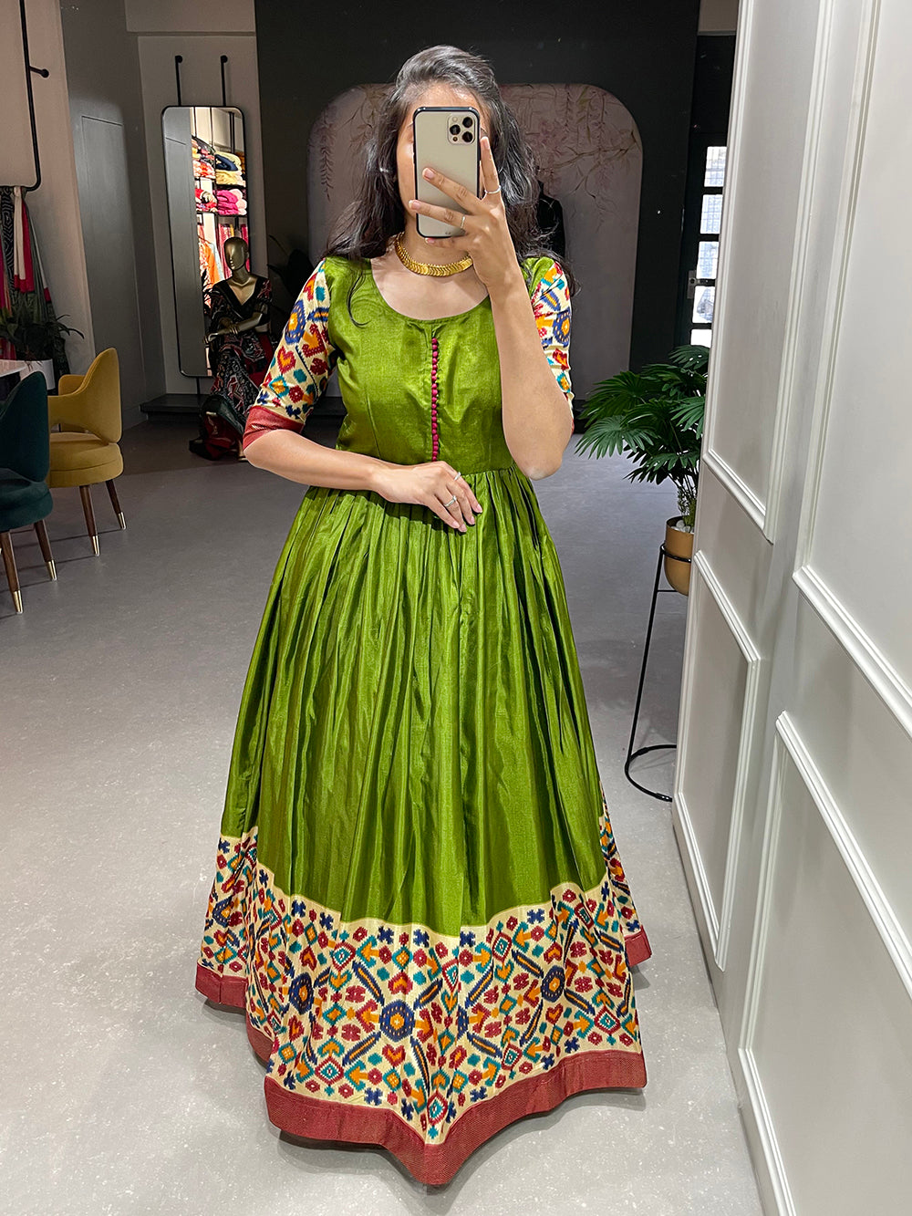 Mehendi Color Foil Printed Dola Silk Gown Clothsvilla