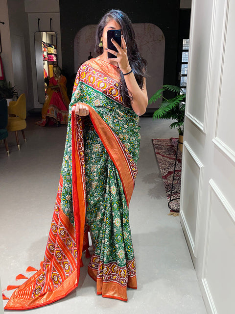 Green Color Patola Printed Dola Silk Saree Clothsvilla Main image