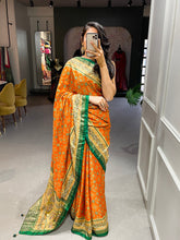 Load image into Gallery viewer, Orange Color Foil Printed And Stone Work Dola Silk Saree Clothsvilla