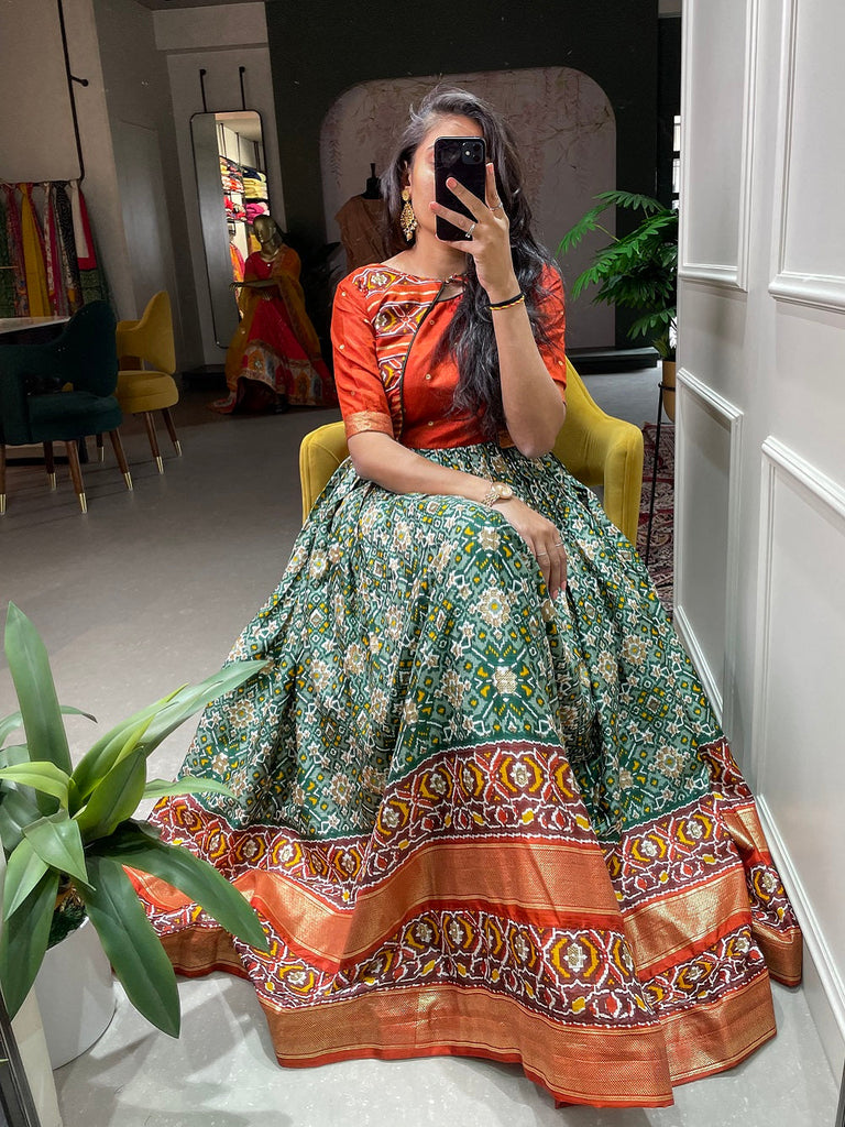 Green Color Patola Paithani Printed And Foil Printed Dola Silk Gown Clothsvilla