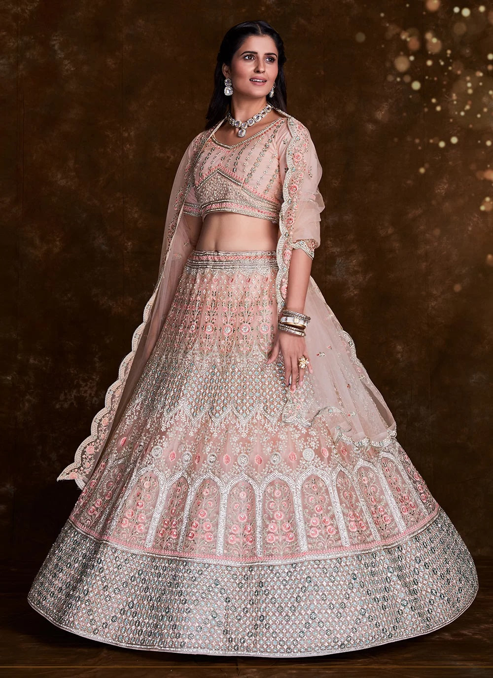 Elegant Peach Net Lehenga Set with Thread and Zari Accents Clothsvilla Main image