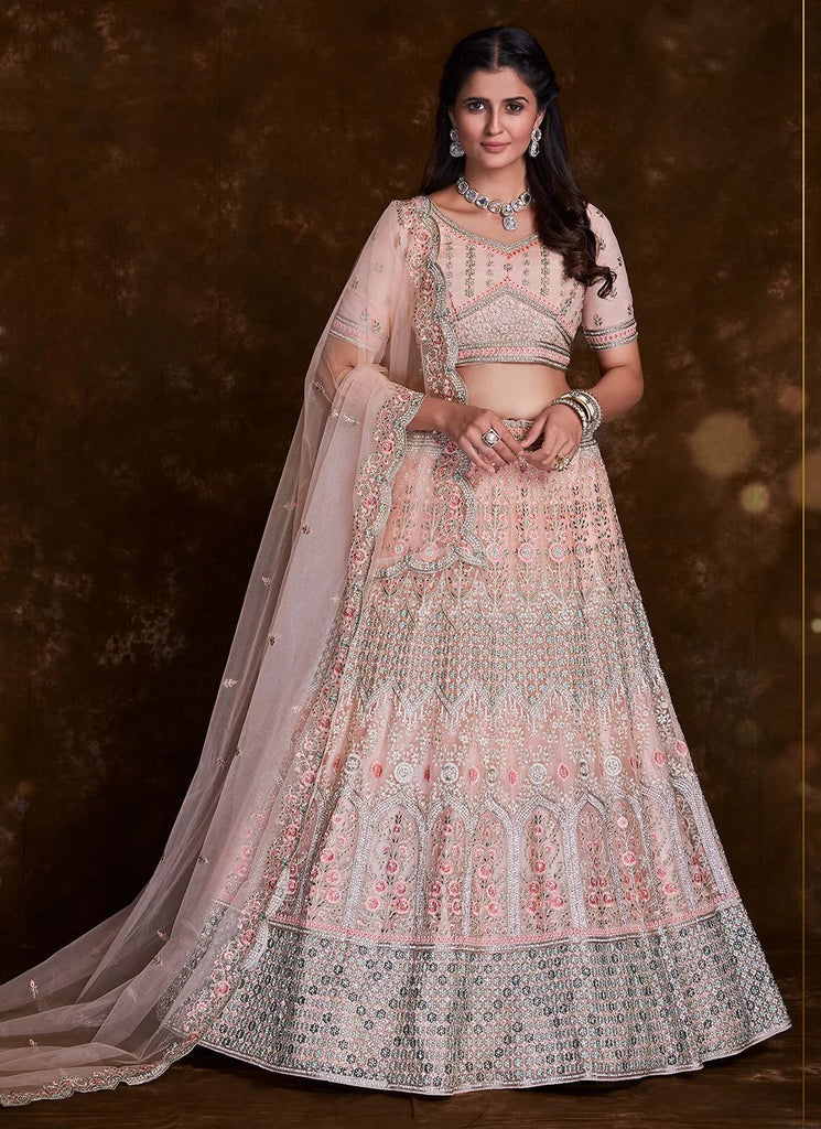 Elegant Peach Net Lehenga Set with Thread and Zari Accents Clothsvilla