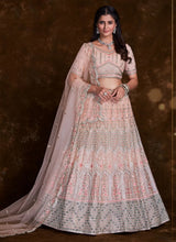 Load image into Gallery viewer, Elegant Peach Net Lehenga Set with Thread and Zari Accents Clothsvilla