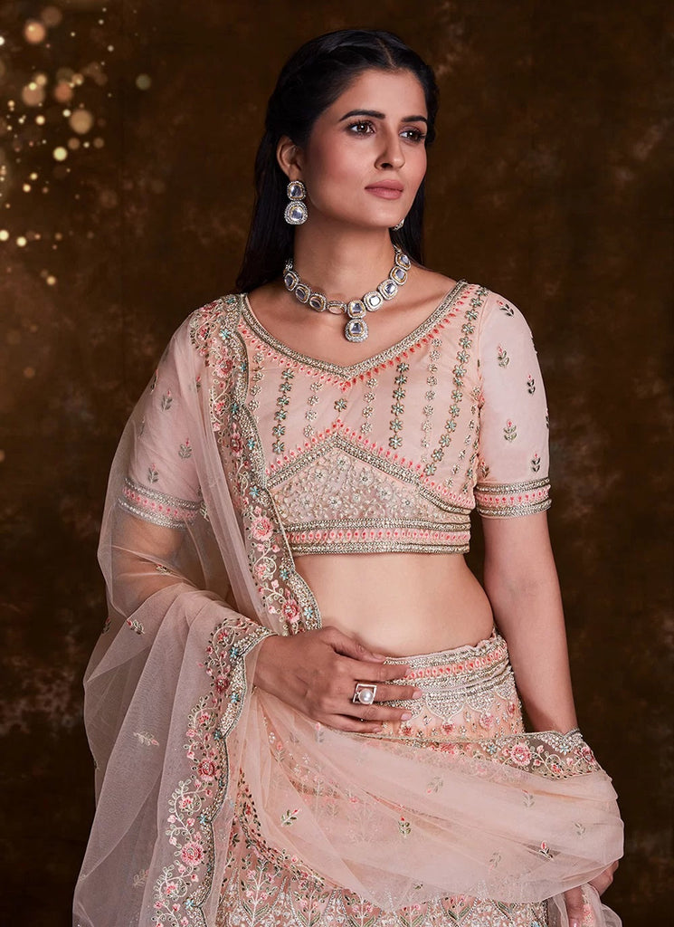 Elegant Peach Net Lehenga Set with Thread and Zari Accents Clothsvilla