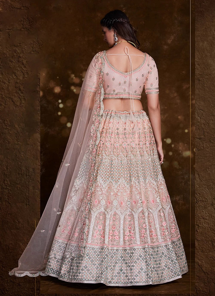 Elegant Peach Net Lehenga Set with Thread and Zari Accents Clothsvilla