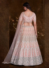 Load image into Gallery viewer, Elegant Peach Net Lehenga Set with Thread and Zari Accents Clothsvilla