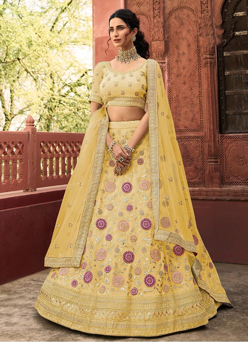 Elegant Yellow Lehenga with Intricate Zarkan Embroidery Clothsvilla Main image