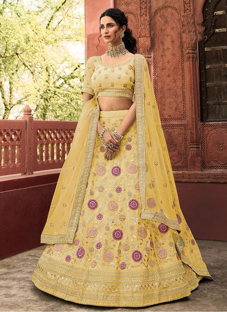 Elegant Yellow Lehenga with Intricate Zarkan Embroidery Clothsvilla