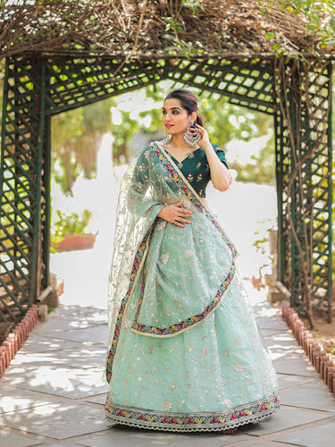 Pista Color Thread Embroidery Work With Lace Border Organza Lehenga Choli ClothsVilla.com