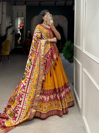 Mustard Color Patola Print With Foil Work Tussar Silk Lehenga Choli ClothsVilla