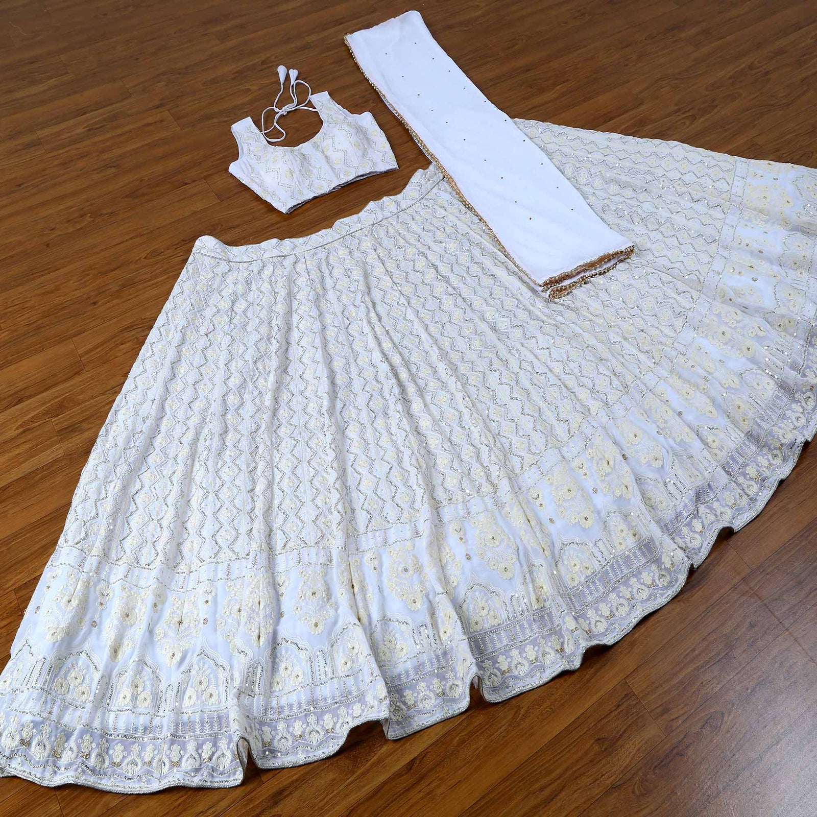 White Sequins Embroidered Georgette Lehenga Choli Clothsvilla