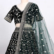 Load image into Gallery viewer, Dark Green Sequins Embroidered Velvet Lehenga Choli Clothsvilla