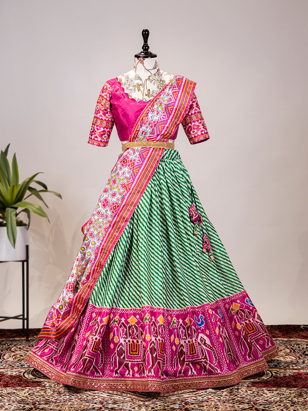 Green Color Leheriya Patola Print Chinon Lehenga Choli Clothsvilla