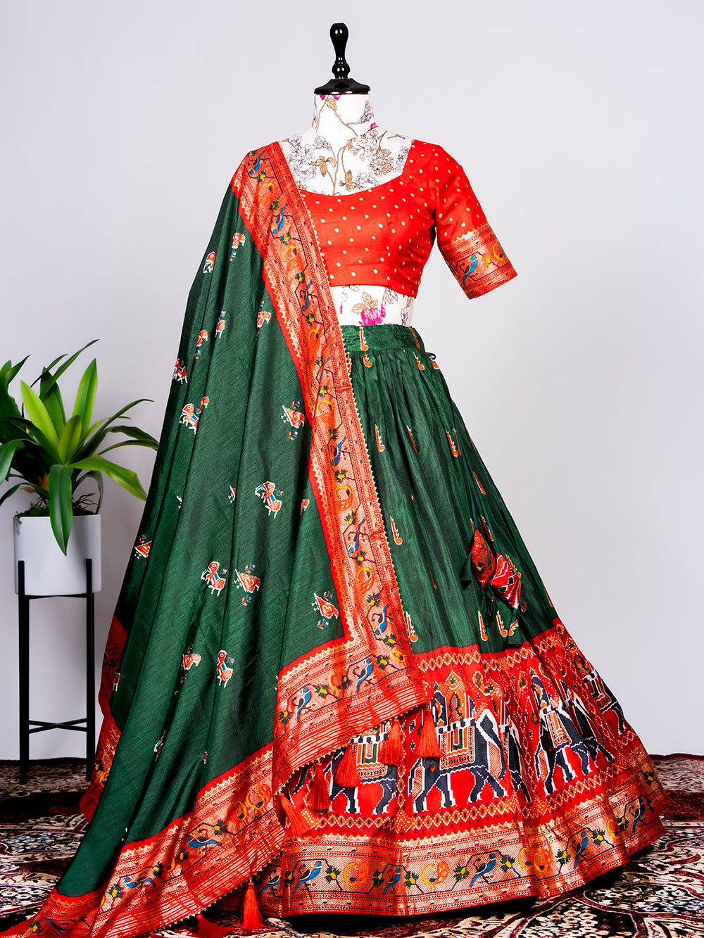 Green Color Haydrabadi Patola Printed Lehenga Choli Clothsvilla Main image