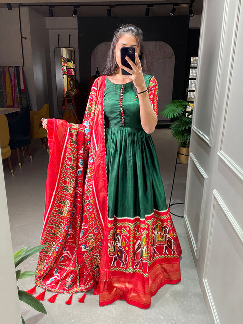 Green Color Patola And Foil Printed Dola Silk Gown Clothsvilla Main image