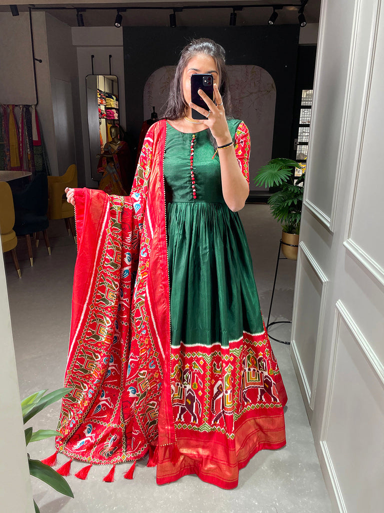 Green Color Patola And Foil Printed Dola Silk Gown Clothsvilla