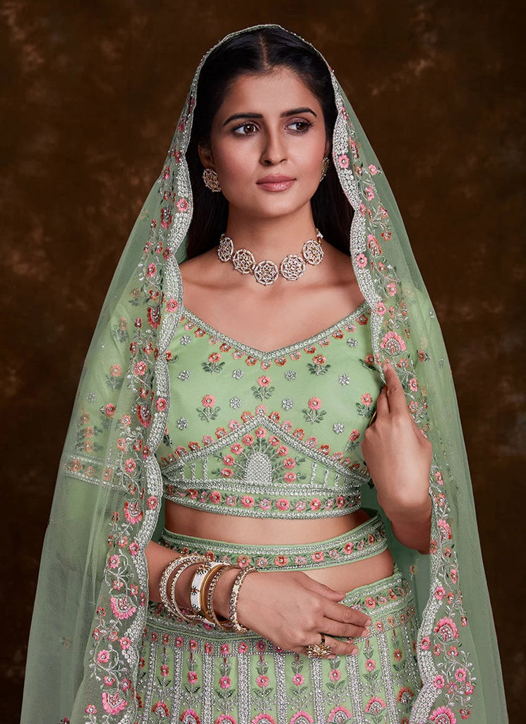 Green Net Zarkan and Thread designer bridal lehenga Clothsvilla