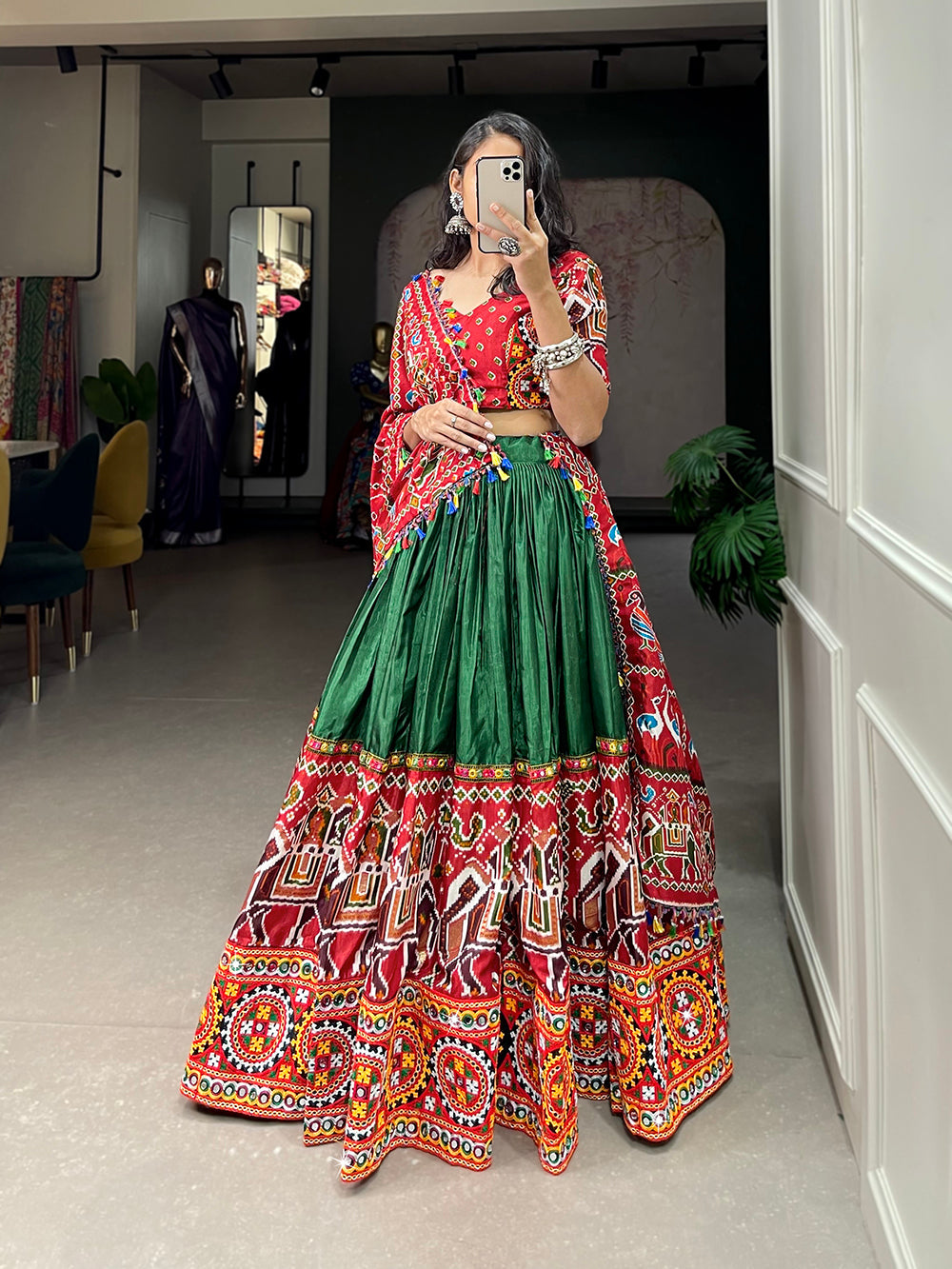 Green Color Patola Print With Gamthi Work And Mirror Work Dola Silk Chaniya Choli ClothsVilla.com