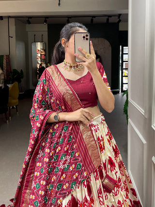 Off White Color Patola Printed With Foil Work Tussar Silk Lehenga Choli ClothsVilla