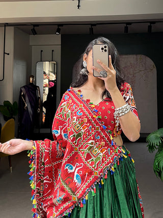 Green Color Patola Print With Gamthi Work And Mirror Work Dola Silk Chaniya Choli ClothsVilla.com