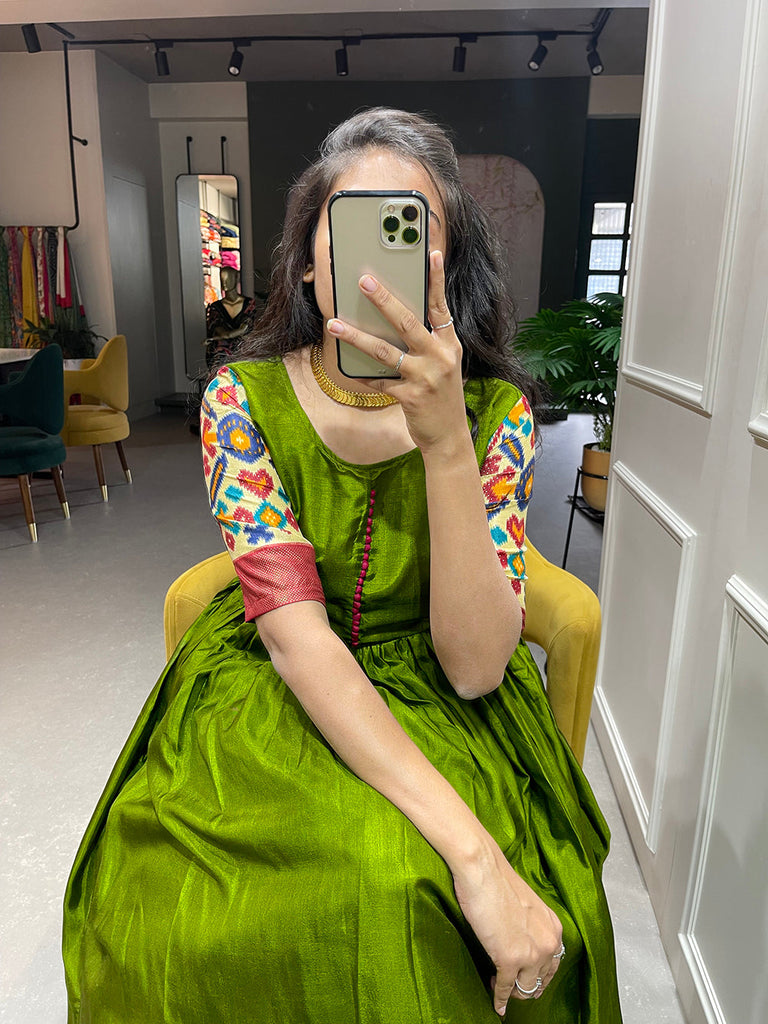 Mehendi Color Foil Printed Dola Silk Gown Clothsvilla